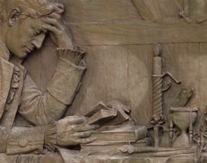 Bas Relief Carved in Stone - Troubled Reader with Candle