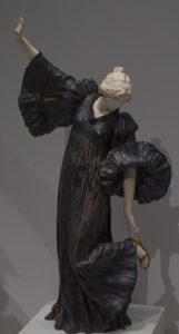 Statue of a Woman in Black Garb